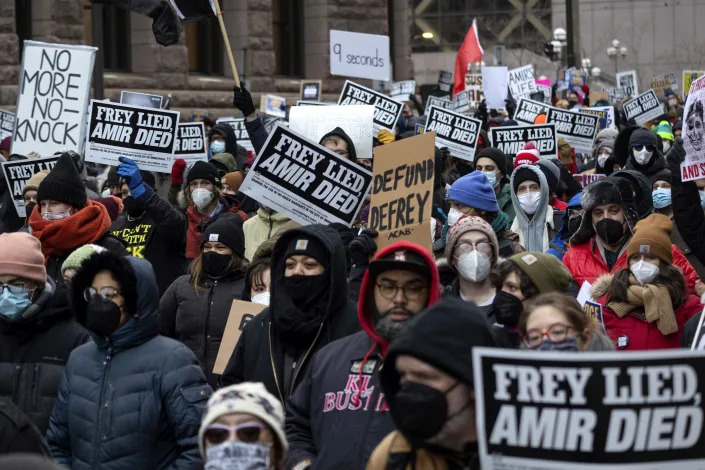 People march at a rally for Amir Locke on Feb. 5 in Minneapolis.