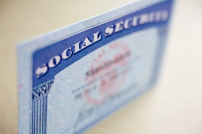 A slightly blurred Social Security card.