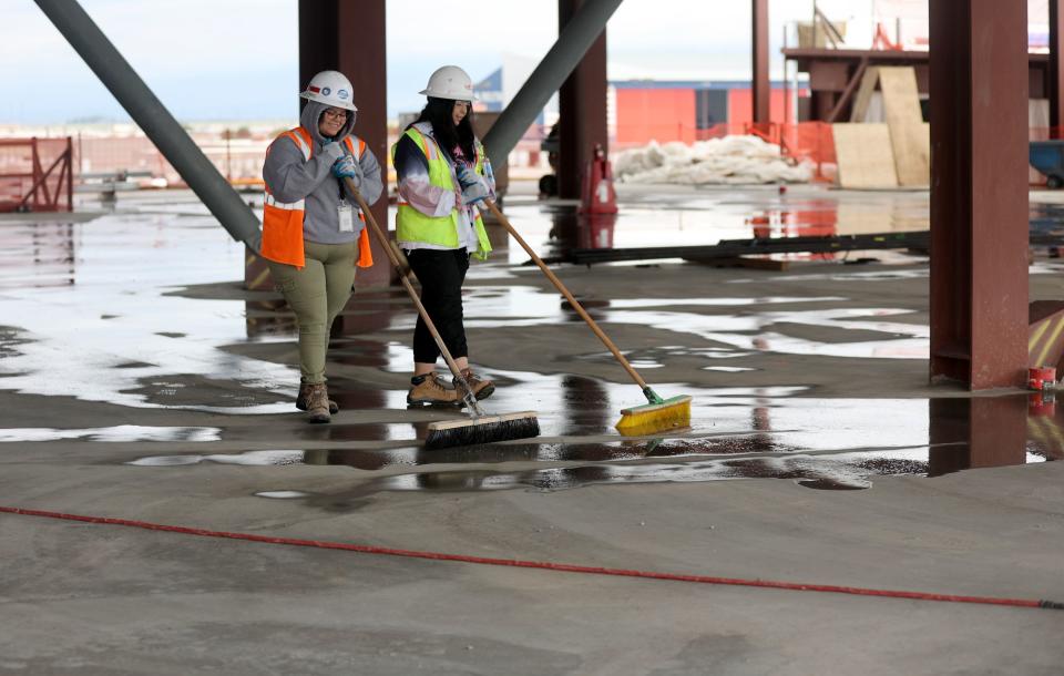 Workers sweep as phase three of the Salt Lake City International Airport construction continues in Concourse B in Salt Lake City on Tuesday, June 20, 2023. | Kristin Murphy, Deseret News