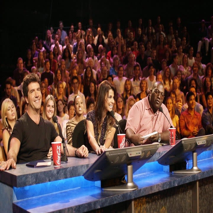 Judges (from left) Simon Cowell, Paula Abdul, and Randy Jackson prepare to watch a live performance on 