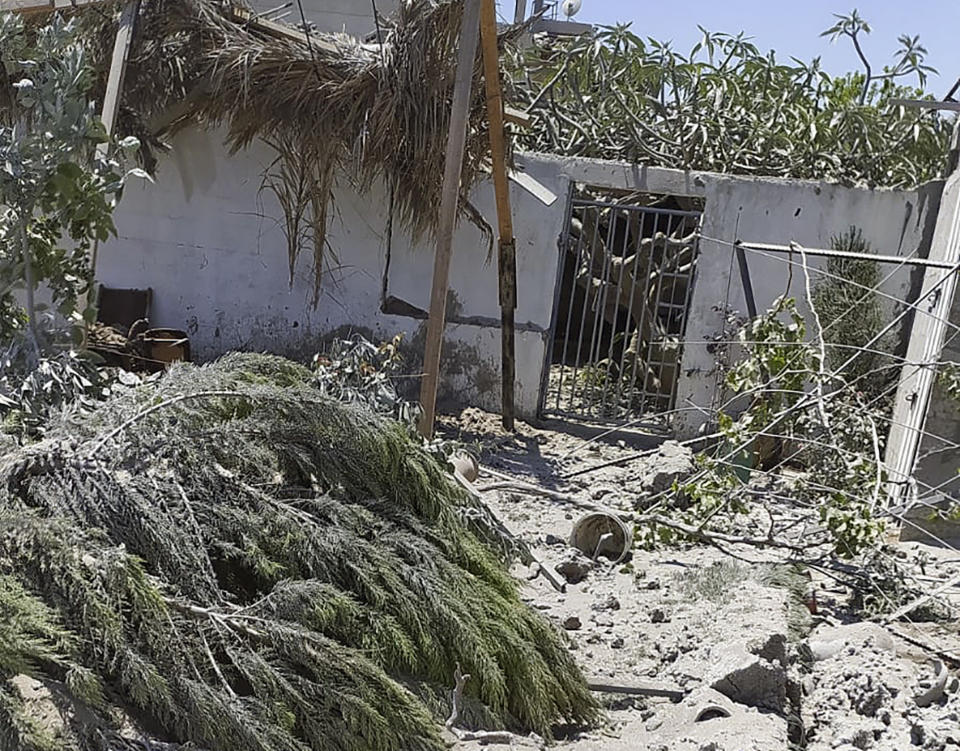 Debris from an Israeli airstrike scatters the family farm of Associated Press journalist Fares Akram on Friday, May 14, 2021, in the northern Gaza Strip. (Fares Akram via AP)