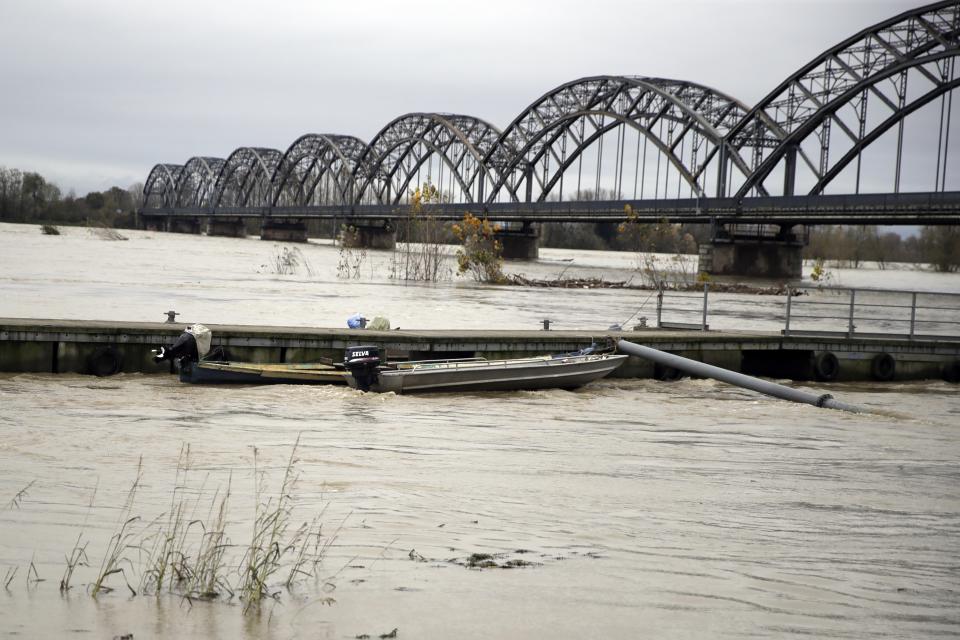 The swollen Po river in Sannazzaro, near Pavia, northern Italy, Sunday, Nov. 24, 2019. Rain-swollen rivers and flooded streets plagued Italy, where it has been raining, sometimes heavily, in much of the country nearly every day for about two weeks. (AP Photo/Luca Bruno)