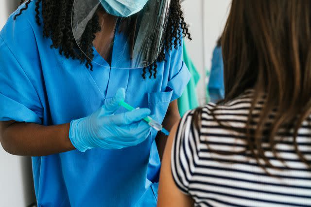 <p>Getty</p> Female doctor with patient (stock photo)