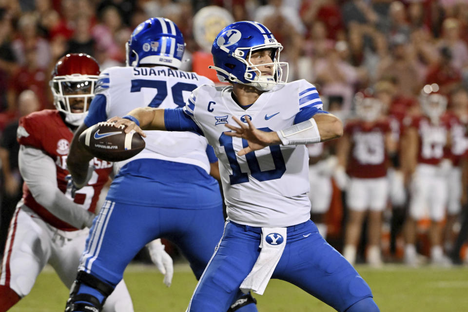 BYU quarterback Kedon Slovis (10) drops back to pass against Arkansas during the second half of an NCAA college football game Saturday, Sept. 16, 2023, in Fayetteville, Ark. (AP Photo/Michael Woods)