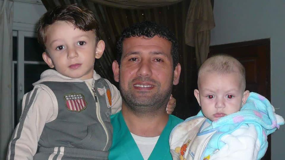 Al-Bursh is pictured with his two children. Colleagues told CNN the doctor "loved life." - Mohammad Al-Bursh