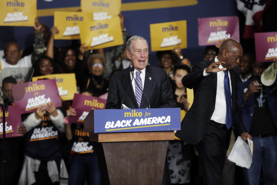 Democratic presidential candidate and former New York City Mayor Michael Bloomberg speaks during a campaign rally at the Buffalo Soldier Museum in Houston, Thursday, Feb. 13, 2020. Houston Mayor Sylvester Turner stands at right. (Elizabeth Conley/Houston Chronicle via AP)