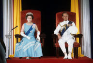 Queen Elizabeth II and the Duke of Edinburgh during the State Opening of Parliament in Bridgetown, Barbados, during her Silver Jubilee tour of the Caribbean.