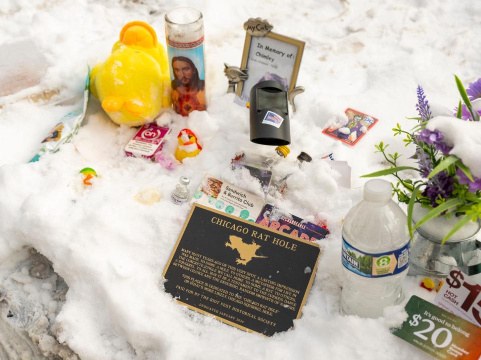 Tributes left in the snow nearby Chicago "rat hole."