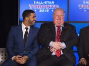 Rapper Drake (L) sits with Toronto Mayor Rob Ford during an announcement that the Toronto Raptors will host the 2016 NBA All-Star game in Toronto, September 30, 2013. Toronto was selected as the host of the National Basketball Association's (NBA) 2016 All-Star Game, marking the first time the showcase event will be held outside of the United States, the league said on Monday. REUTERS/Mark Blinch (CANADA - Tags: SPORT BASKETBALL ENTERTAINMENT POLITICS)