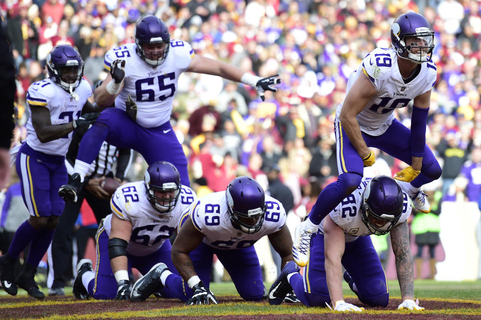 <p>Wide receiver Adam Thielen #19 of the Minnesota Vikings celebrates with teammates after scoring a touchdown during the second quarter against the Washington Redskins at FedExField on November 12, 2017 in Landover, Maryland. (Photo by Patrick McDermott/Getty Images) </p>