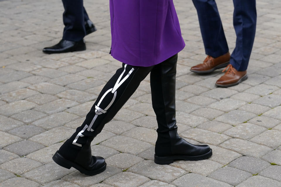 Jill Biden wears boots bearing the word "Vote" as she and her husband, Democratic presidential nominee Joe Biden, depart after voting early in Delaware's state primary election on Sept. 14, 2020. (Photo: ASSOCIATED PRESS)