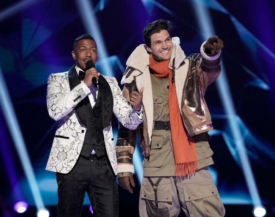 "The Masked Singer" host Nick Cannon and unmasked Rhino Barry Zito on the May 13 episode.