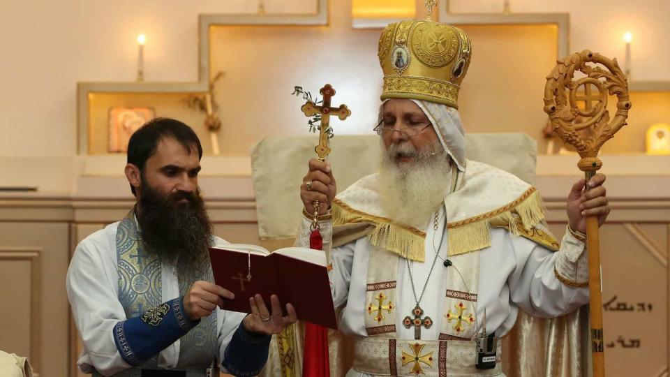 Fr Isaac Royel (left) and Bishop Mar Mari Emmanuel