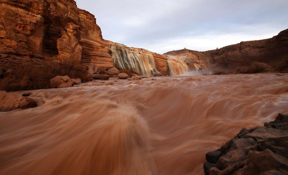 Grand Falls in the Painted Desert on the Navajo Nation on March 28, 2019, near Leupp, Arizona. Melted snow and rain travels down the Little Colorado River to the 185-foot fall a.k.a. Chocolate Falls. Grand Falls is 18 feet taller than Niagara Falls.