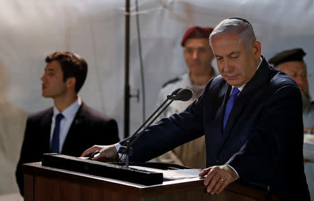 Israeli Prime Minister Benjamin Netanyahu speaks during the funeral of Zachary Baumel, a U.S.-born Israeli soldier missing since a 1982 tank battle against Syrian forces and whose remains were recently recovered by Israel, at the Mount Herzl military cemetery in Jerusalem April 4, 2019. REUTERS/Ronen Zvulun