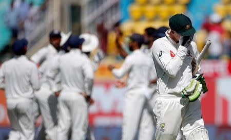 Cricket - India v Australia - Fourth Test cricket match - Himachal Pradesh Cricket Association Stadium, Dharamsala, India - 27/03/17 - Australia's Peter Handscomb (R) reacts after being dismissed. REUTERS/Adnan Abidi