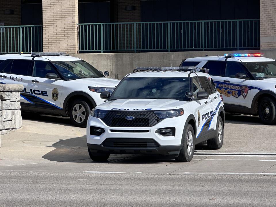 Dozens of officers and state troopers from across several cities in Montgomery and Greene counties gathered outside Miami Valley Hospital Tuesday as Officer Cody Cecil was released from Miami Valley Hospital five days after he was shot while serving a warrant in Clayton. (Scott Kessler/Staff)