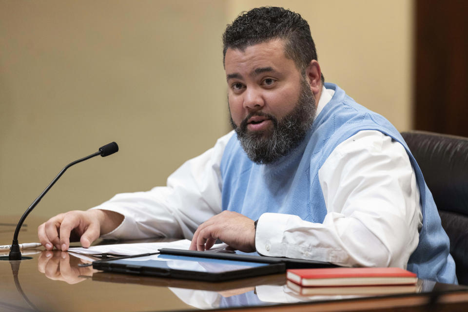 Nebraska state Sen. Justin Wayne speaks on behalf of LB20, a bill he introduced to provide restoration of voting rights upon completion of a felony sentence or probation for a felony, during a hearing before the Government, Military and Veterans Affairs committee on Wednesday, Feb. 22, 2023, at the Nebraska state Capitol in Lincoln, Neb. (AP Photo/Rebecca S. Gratz)