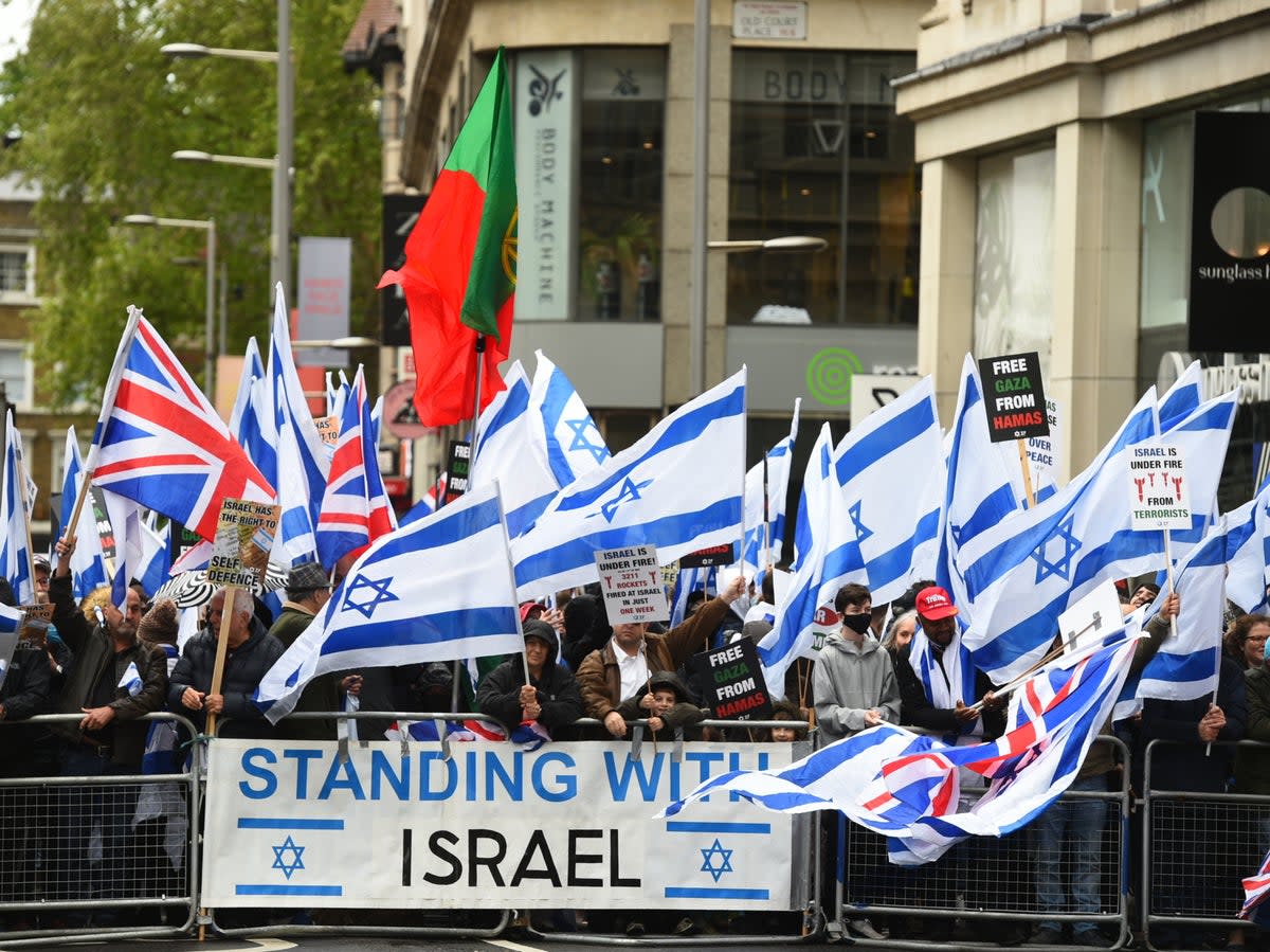 Hundreds of pro-Israel demonstrators gathered outside the Israeli embassy in London on Sunday for a rally (PA)