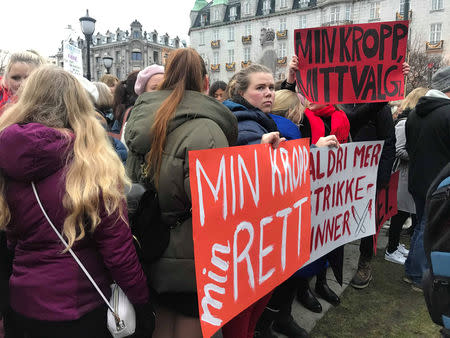 A woman holds a placard during a demonstration against changes of the country's abortion law in Oslo, Norway November 17, 2018. Sign reads "My body, my rights". REUTERS/Lefteris Karagiannopoulos