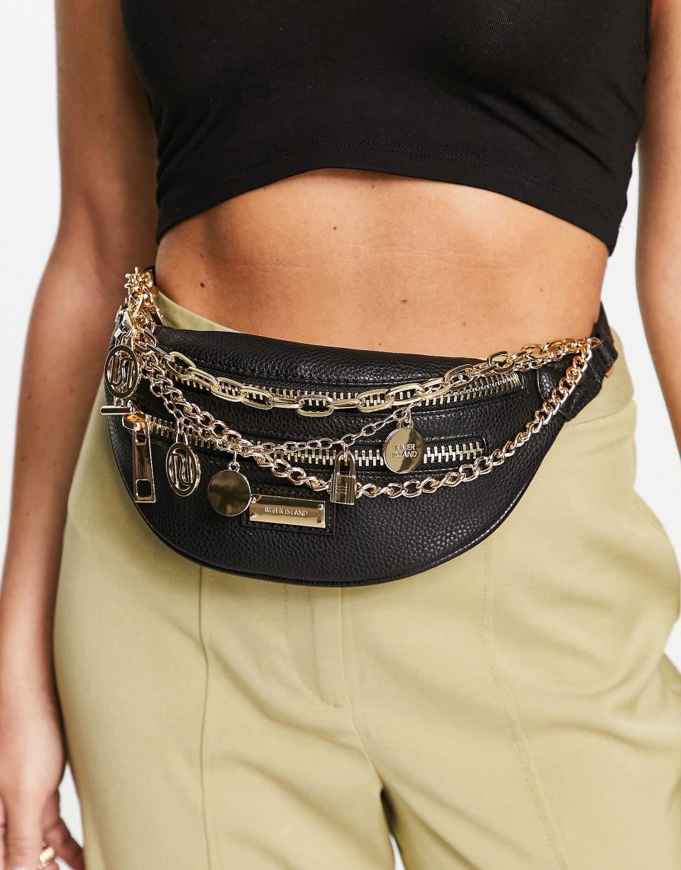 <p><a href="https://go.redirectingat.com?id=74968X1596630&url=https%3A%2F%2Fwww.asos.com%2Fus%2Friver-island%2Friver-island-charm-chain-fanny-pack-in-black%2Fprd%2F202741261&sref=https%3A%2F%2Fwww.oprahdaily.com%2Fstyle%2Fg25926498%2Fcute-fanny-packs%2F" rel="nofollow noopener" target="_blank" data-ylk="slk:Shop Now;elm:context_link;itc:0;sec:content-canvas" class="link ">Shop Now</a></p><p>Charm Chain Fanny Pack</p><p>us.asos.com</p><p>$41.75</p>