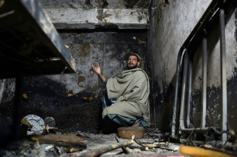 Mohammad Umair returns to his apartment in Karachi where a fire that started in garbage outside the building killed his three children