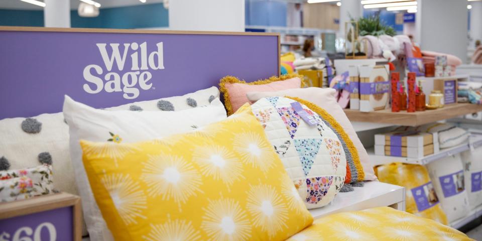 A bed with Wild Sage products.