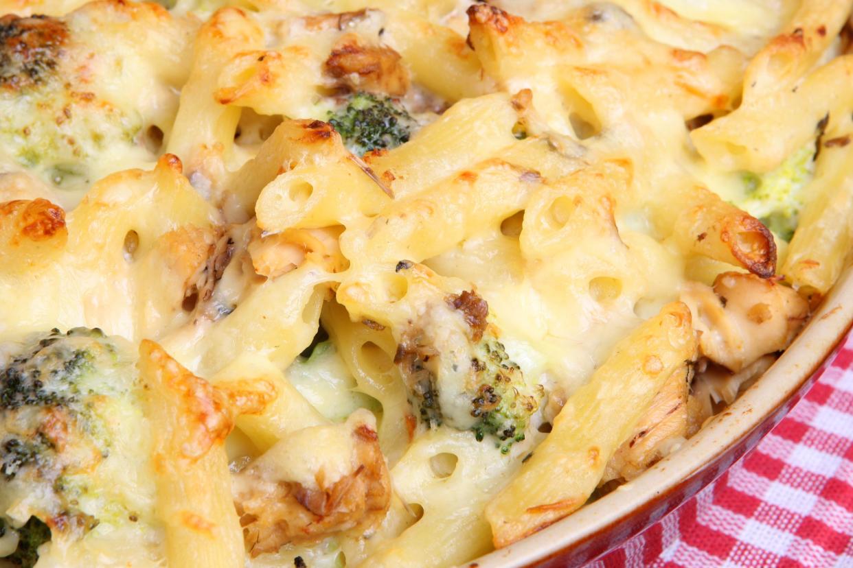 Rigatoni pasta bake with salmon and broccoli in a cheese sauce