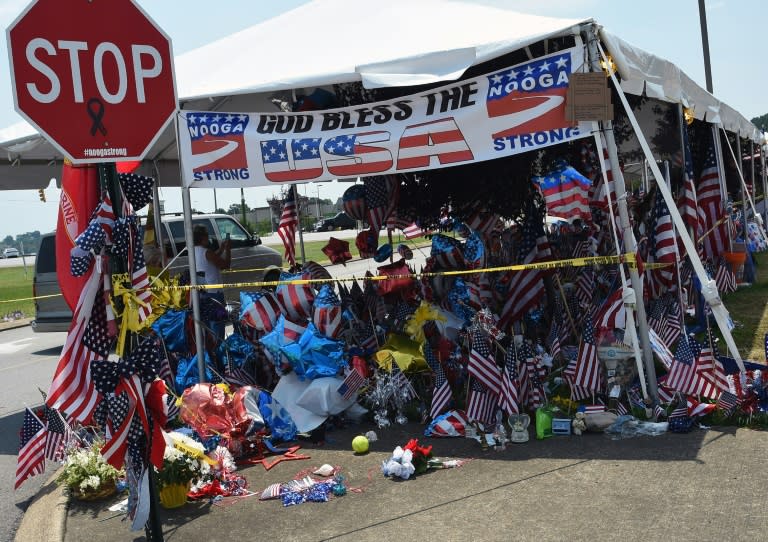 A memorial stands in Chattanooga, Tennessee in memory of five members of the military killed after a gunman opened fire on a recruiting station at a strip mall and then drove to a Navy operational support center