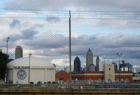 The Atlanta city skyline is seen behind a water tower, Atlanta, Georgia, U.S. October 27, 2018. REUTERS/Lawrence Bryant