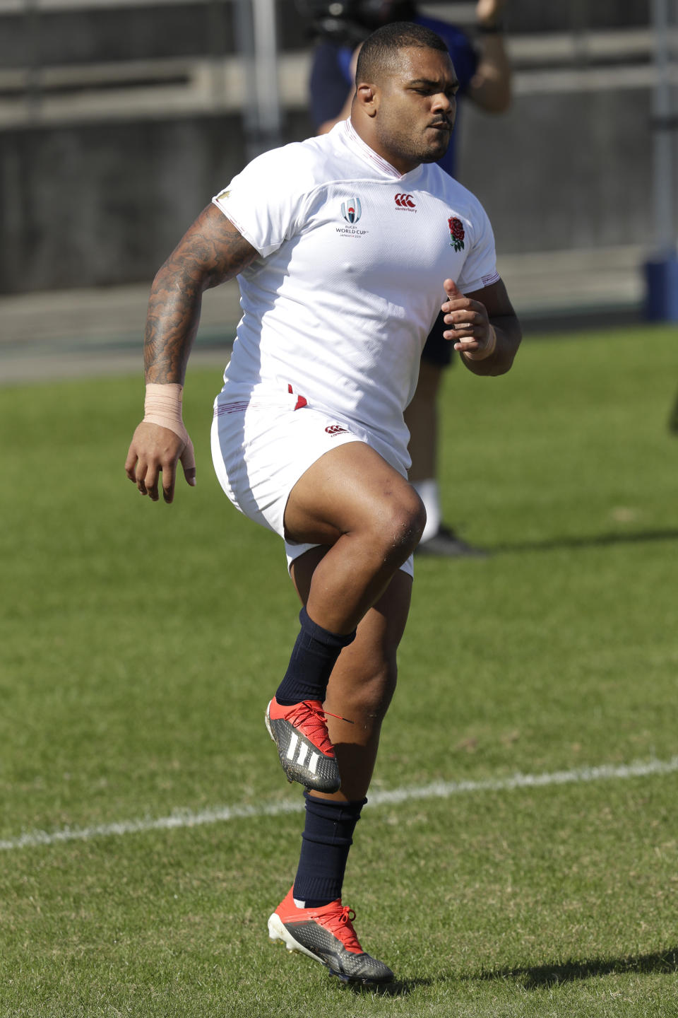 England's Kyle Sinckler stretches during their final training session in Tokyo, Japan, Friday, Nov.1, 2019. England will play South Africa in the Rugby World Cup final on Saturday Nov. 2. in Yokohama. (AP Photo/Mark Baker)