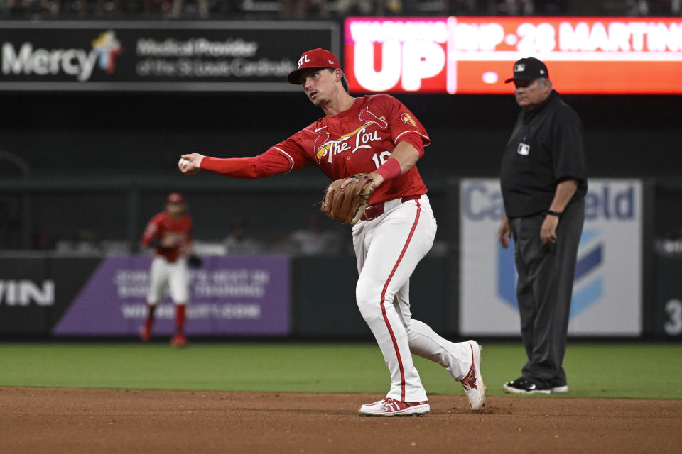 St. Louis Cardinals second baseman Nolan Gorman throws out Cincinnati Reds' Jonathan India at first base in the seventh inning of a baseball game, Friday, June 28, 2024, in St. Louis. (AP Photo/Joe Puetz)