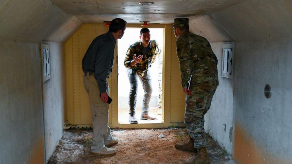 Brian J. Blusius with the Army Corps of Engineers, center, explains the design feature on the U.S. Army Central’s Bunker Retrofit project while at Fort Polk, La., March 10, 2024. (Army Corps of Engineers)