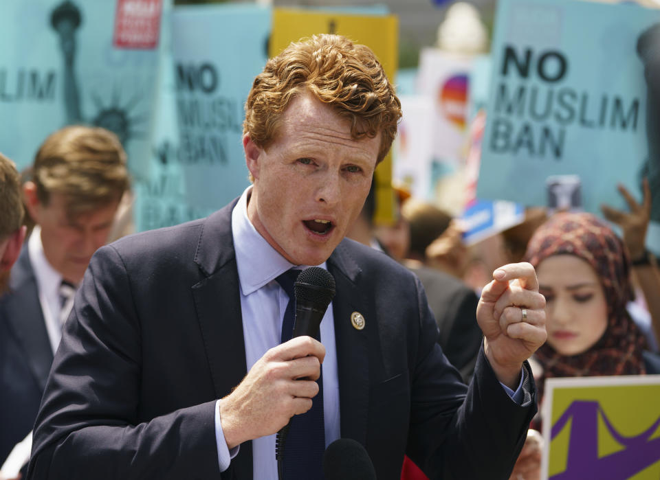 FILE - In this June 26, 2018 file photo, Rep. Joe Kennedy, D-Mass., speaks during the "We Will Not Be Banned" protest sponsored by Muslim Advocates in front of the Supreme Court in Washington. Some Massachusetts voters see Sen. Edward Markey as potentially vulnerable to a primary challenge, and one group is even trying to persuade Kennedy to run for his seat. Markey already has two declared primary challengers, and now a group has launched a bid to draft Kennedy. The congressman has said he doesn’t want the seat. (AP Photo/Carolyn Kaster, File)