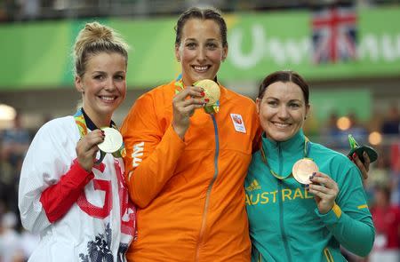 2016 Rio Olympics - Cycling Track - Victory Ceremony - Women's Keirin Victory Ceremony - Rio Olympic Velodrome - Rio de Janeiro, Brazil - 13/08/2016. Rebecca James (GBR) of Britain with the silver medal, Elis Ligtlee (NED) of Netherlands with the gold medal, Anna Meares (AUS) of Australia with the bronze medal pose on podium. REUTERS/Matthew Childs