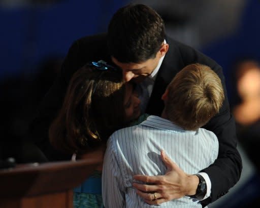 Republican vice presidential nominee Paul Ryan hugs his daughter Liza (L) and son Charlie after his speech at the Tampa Bay Times Forum in Tampa, Florida, on August 29, during the Republican National Convention. Ryan energized Mitt Romney's White House bid with a scathing take-down of Barack Obama's economic record as he accepted the vice presidential nomination
