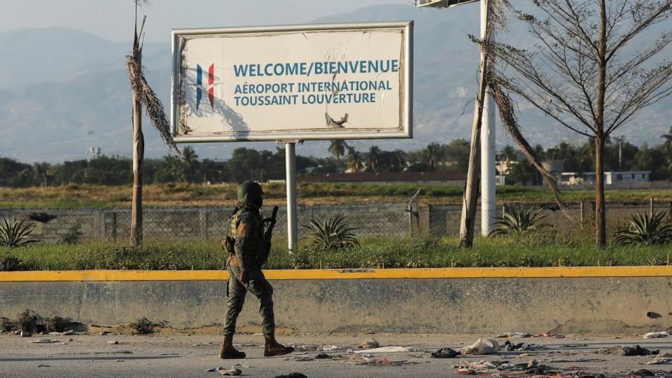 PHOTO: A Haitian soldier patrols outside the Toussaint Louverture International Airport following a gunfight with armed gangs in the surrounding area in Port-au-Prince, Haiti, on March 4, 2024. (Ralph Tedy Erol/Reuters)