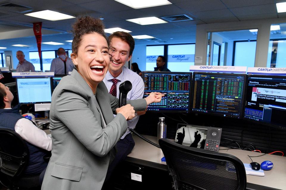 Ilana Glazer gets in on the action during the annual September 11th charity day hosted by Cantor Fitzgerald, BGC and GFI on Wednesday in N.Y.C.