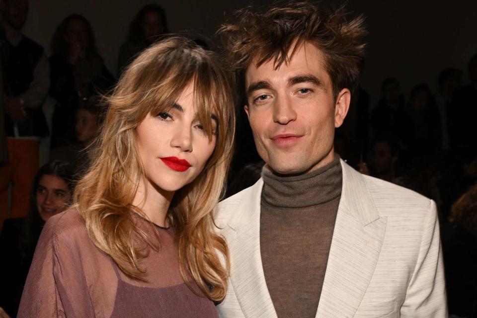 Stephane Cardinale - Corbis/Corbis via Getty Images Suki Waterhouse and Robert Pattinson