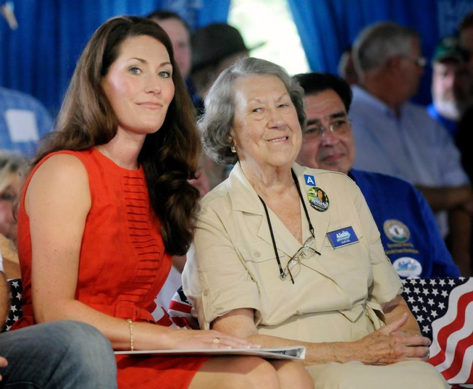 Alison Lundergan Grimes, who is challenging U.S. Sen. Mitch McConnell for his U.S. Senate seat next year, sat by her grandmother, Elsie Case, 83, Saturday at the 133rd annual Fancy Farm Picnic in Graves County. Photo by Tom Eblen | teblen@herald-leader.com