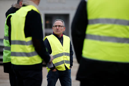 FILE PHOTO: Bareto Agostinho and yellow vests movement members gather before a meeting at the city hall in Flagy, France, January 9, 2019. Picture taken January 9, 2019. REUTERS/Benoit Tessier/File Photo