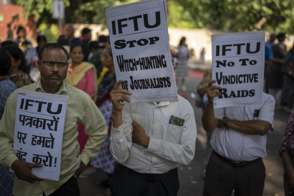 Activists of various student and left organizations hold placards during a protest against the arrest of the editor of a news website and one of its administrators after raiding the homes of journalists, in New Delhi, India, Wednesday, Oct. 4, 2023. Police in New Delhi on Tuesday arrested the editor of a news website and one of its administrators after raiding the homes of journalists working for the site, which has been critical of Prime Minister Narendra Modi and his Hindu nationalist-led government. (AP Photo/Altaf Qadri)