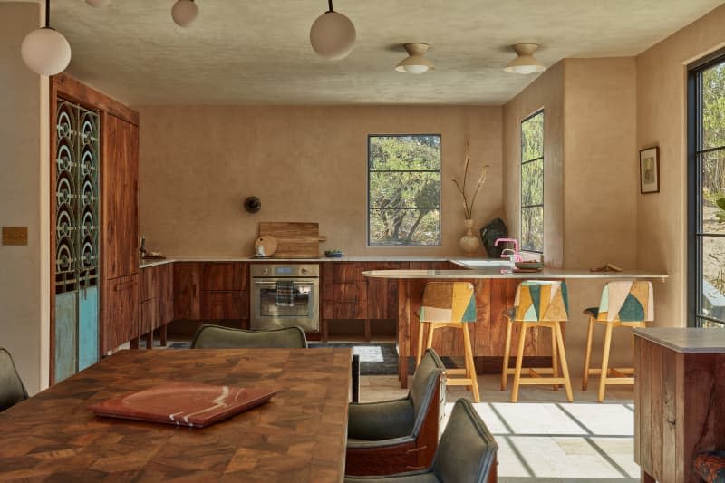 Kitchen painted in coda roman clay with other warm colors