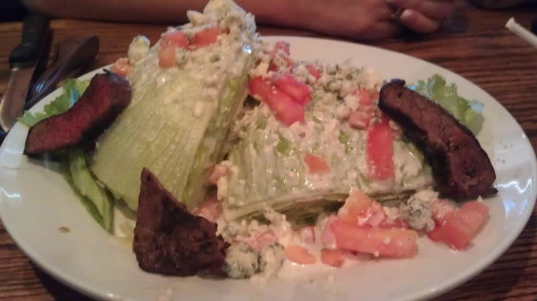 Messy wedge salad with steak