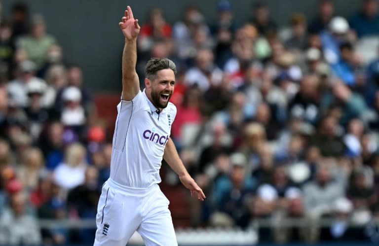 Got him: England's Chris Woakes celebrates having Sri Lanka's Angelo Mathews lbw for a duck in the first Test at Old Trafford (Paul ELLIS)