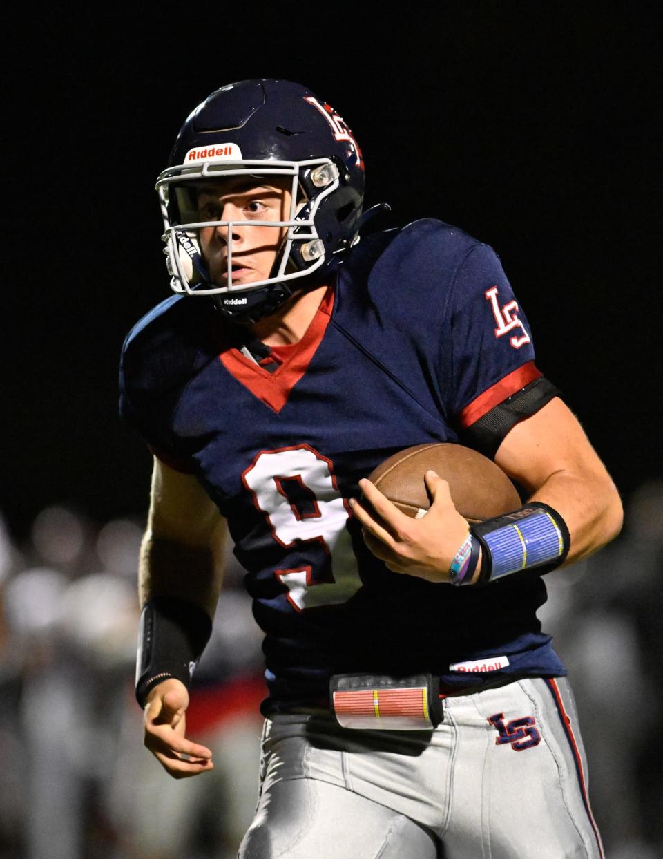 Cooper Tarantino of Lincoln-Sudbury runs the ball during a football game versus Brockton at Lincoln-Sudbury High School, Friday, Sept. 22, 2023. Lincoln-Sudbury defeated Brockton 29-21 in overtime.