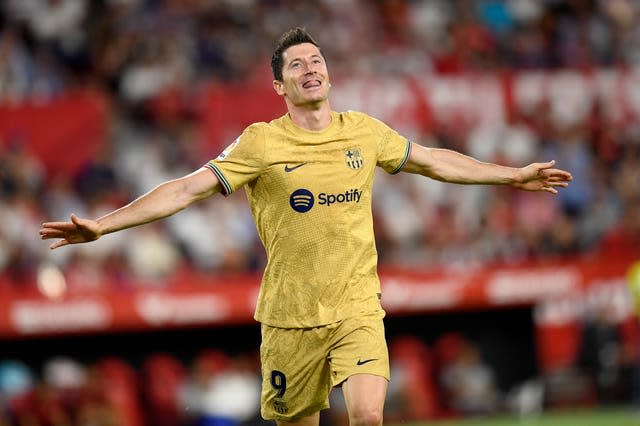 Barcelona’s Robert Lewandowski celebrates after scoring