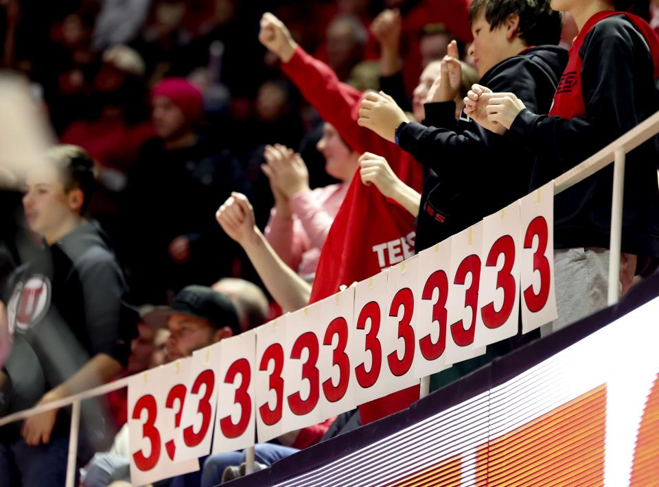 Utah fans keep track of the team’s 3-pointers against UCLA at the University of Utah’s Huntsman Center in Salt Lake City on Thursday, Jan. 11, 2024. | Laura Seitz, Deseret News