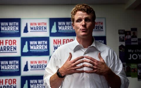 Kennedy talks to volunteers while campaigning for Elizabeth Warren's 2020 Presidential run - Credit: AP