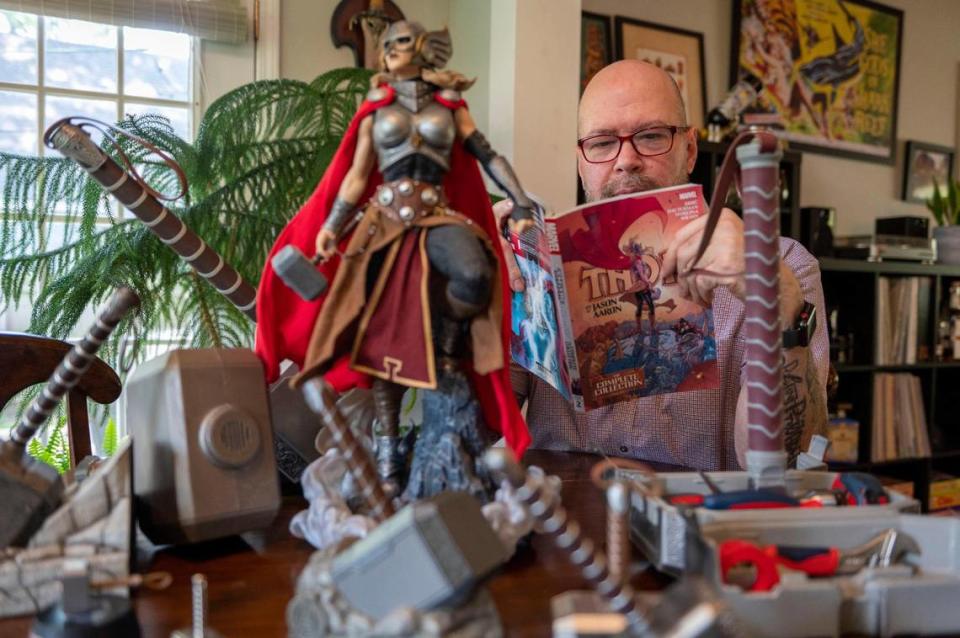 Jason Aaron’s Prairie Village home is packed with memorabilia from his Marvel comic book projects, including this high-quality action figure of Jane Foster, who gains new strength from Aaron’s plotlines.